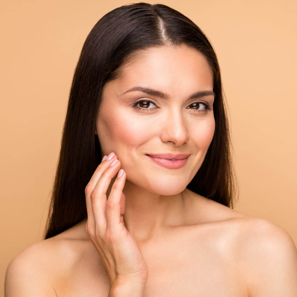 woman 30s with flawless skin