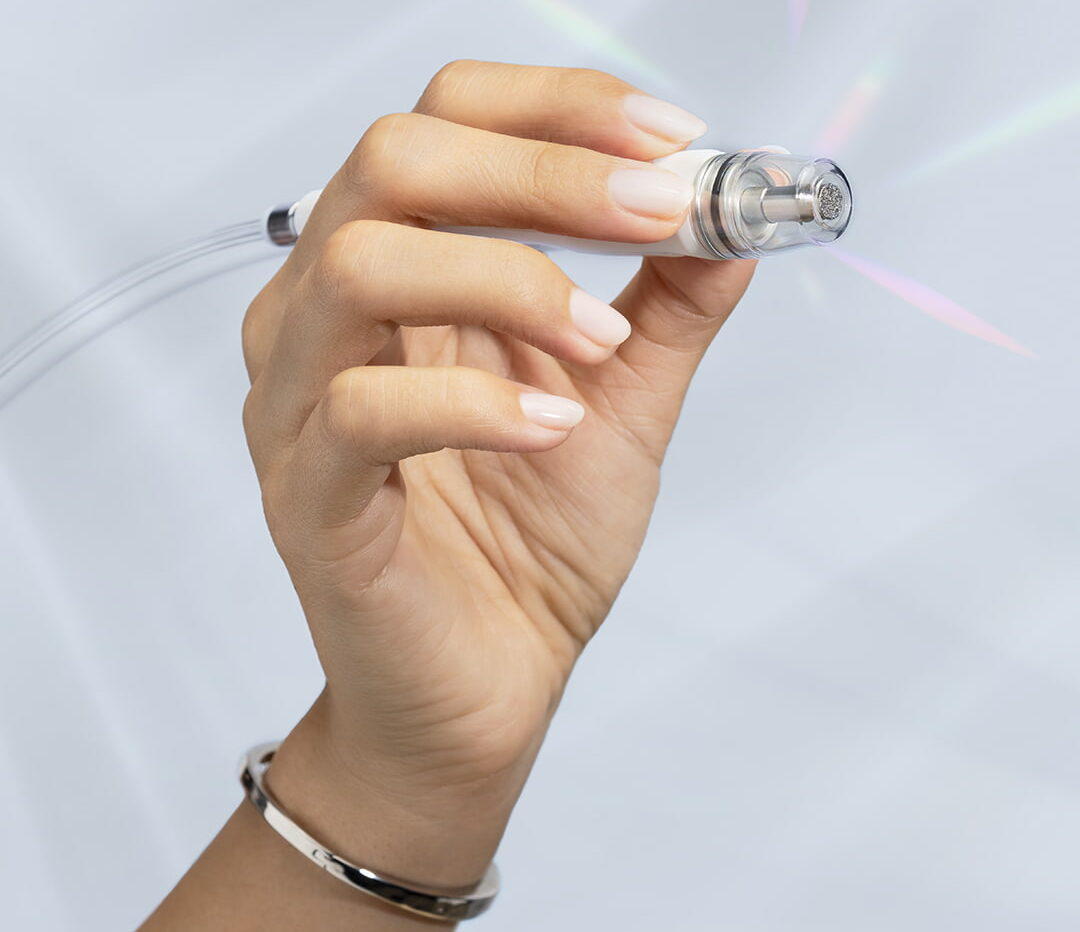 The Diamondglow device being held by a woman
