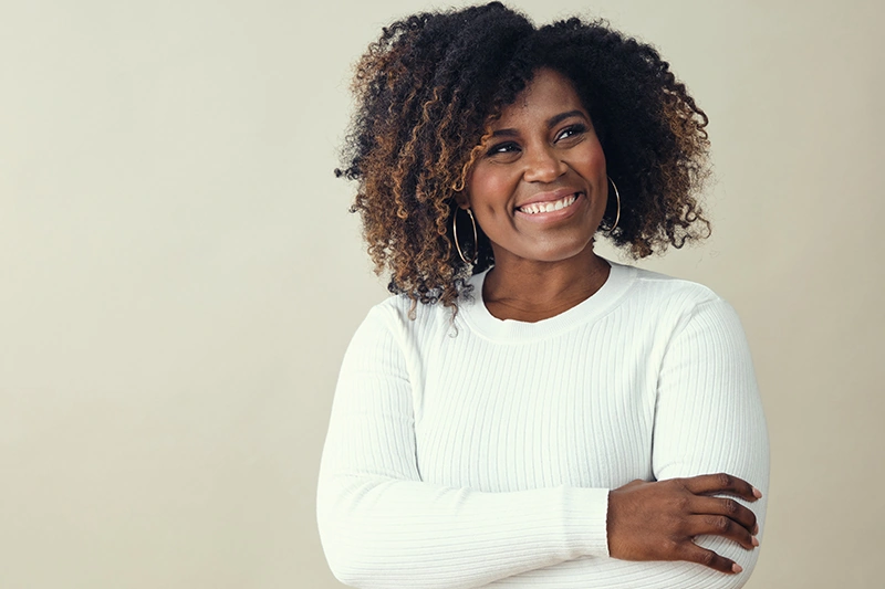 beautiful black woman smiling with radiant skin