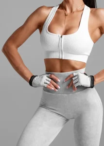 Fit woman with workout gloves on
