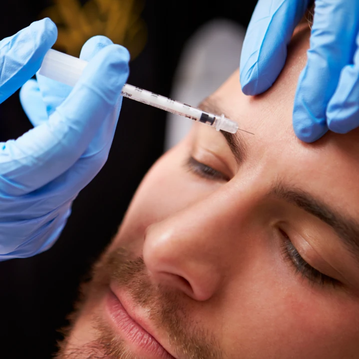 botox treatment on man's glabella