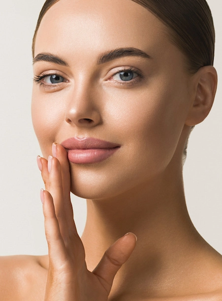 beautiful confident woman with glowing smooth skin