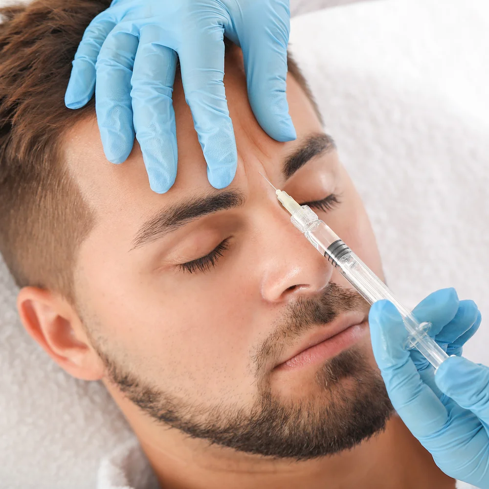 Male patient during daxxify injections
