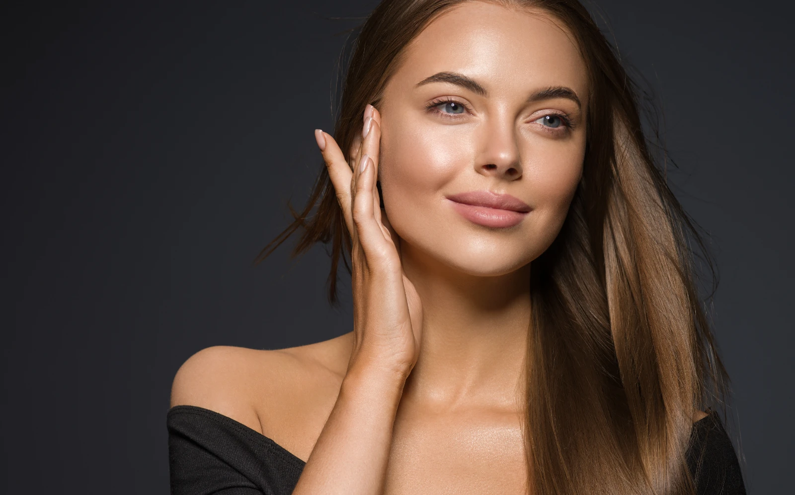 beautiful confident woman with glowing smooth skin