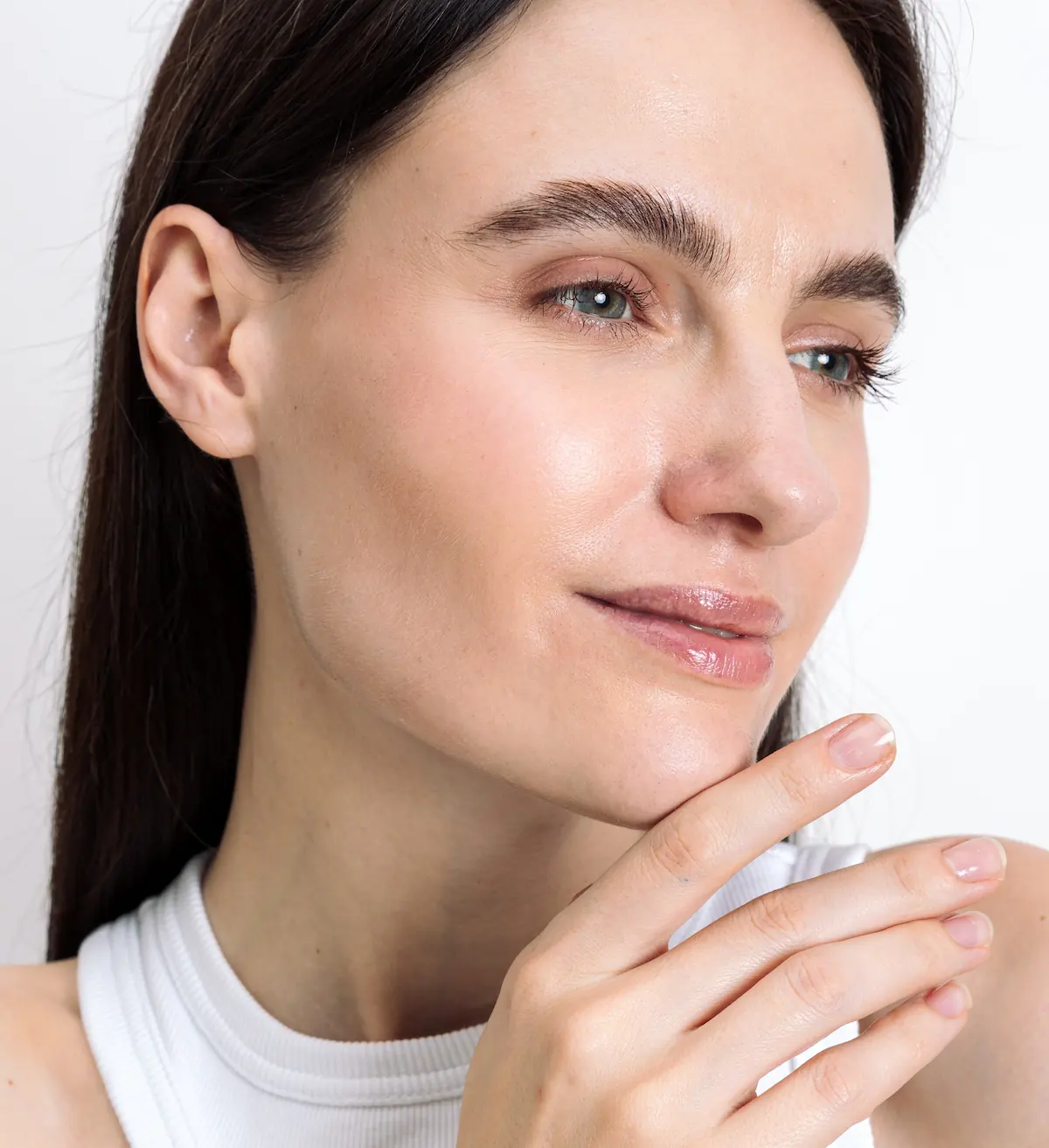 close up of mid-aged woman's face with flawless complexion