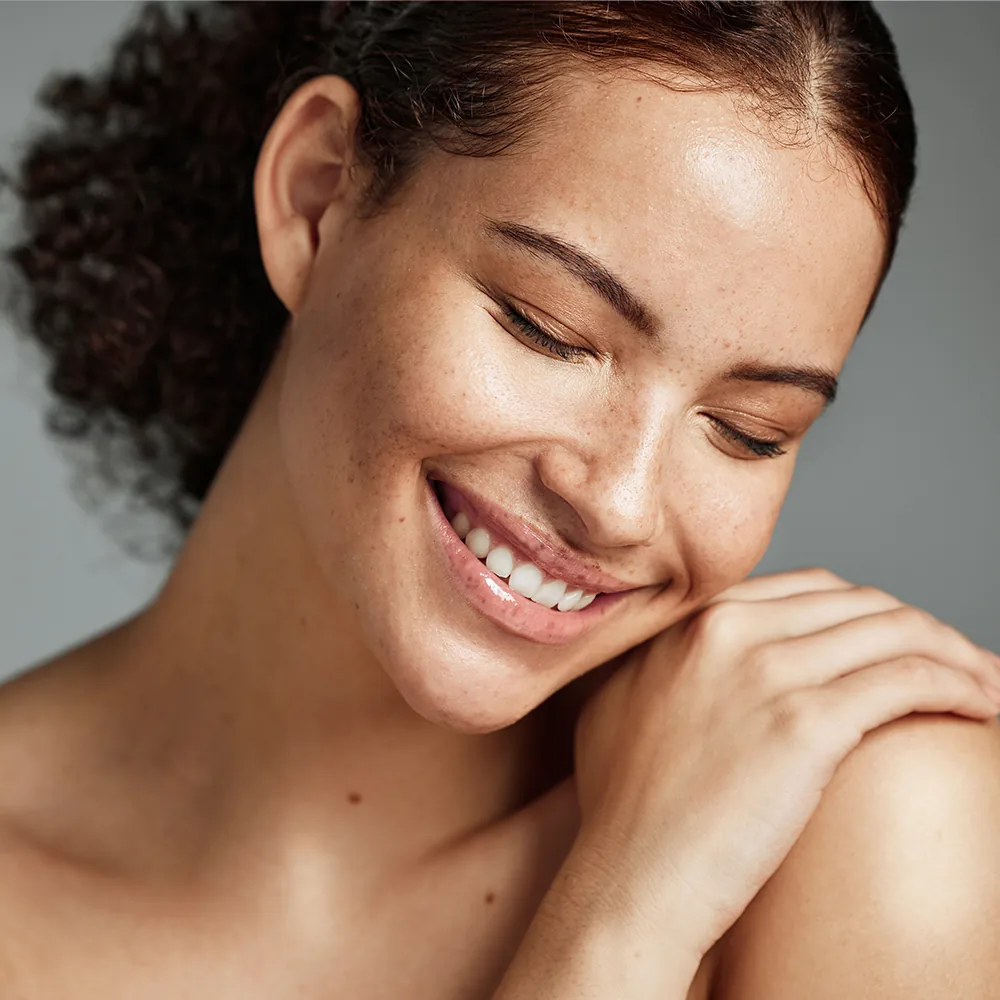 happy woman touching soft skin