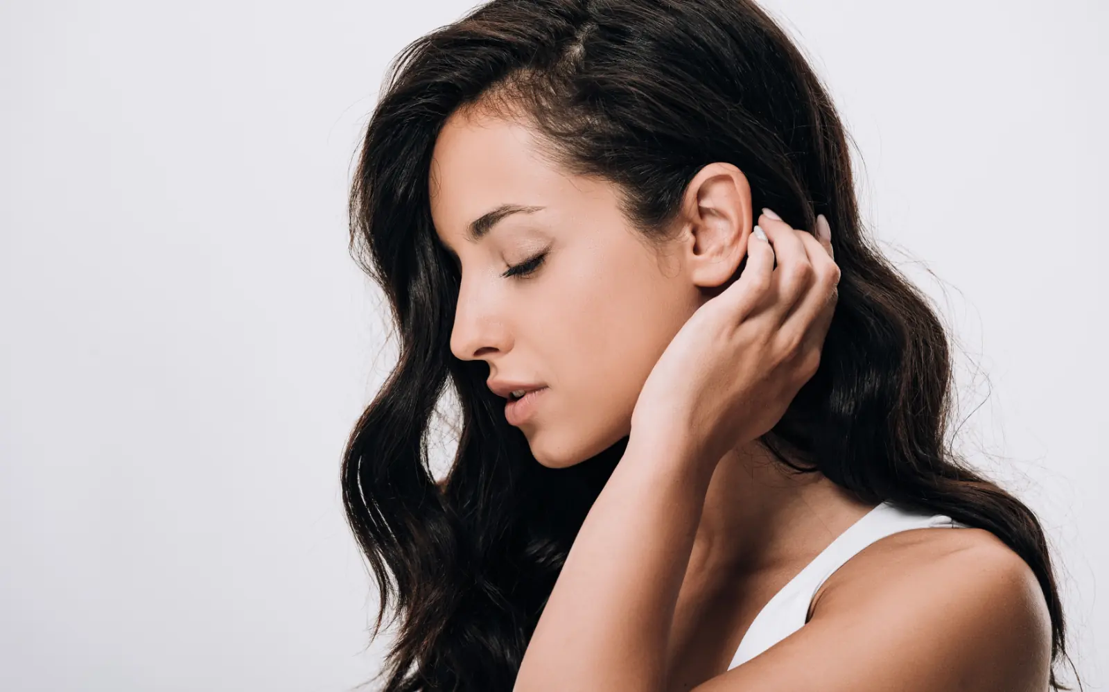 woman touching healthy hair