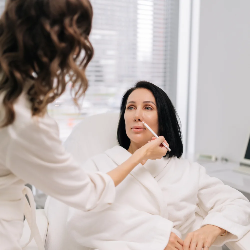 woman during injectable filler consultation