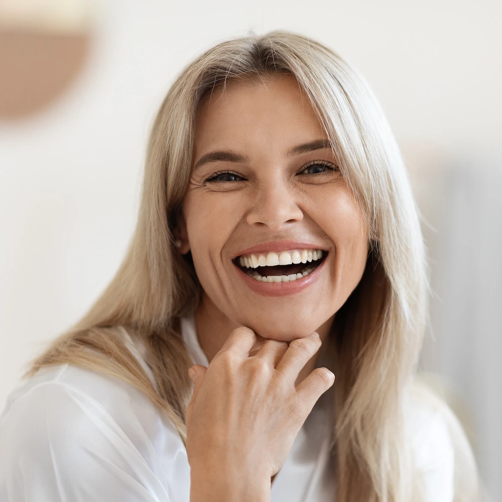 woman with a big smile on her face