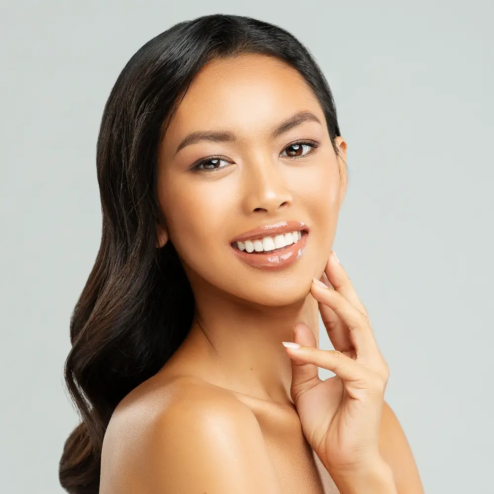 20s woman with glowing skin after Glo2Facial