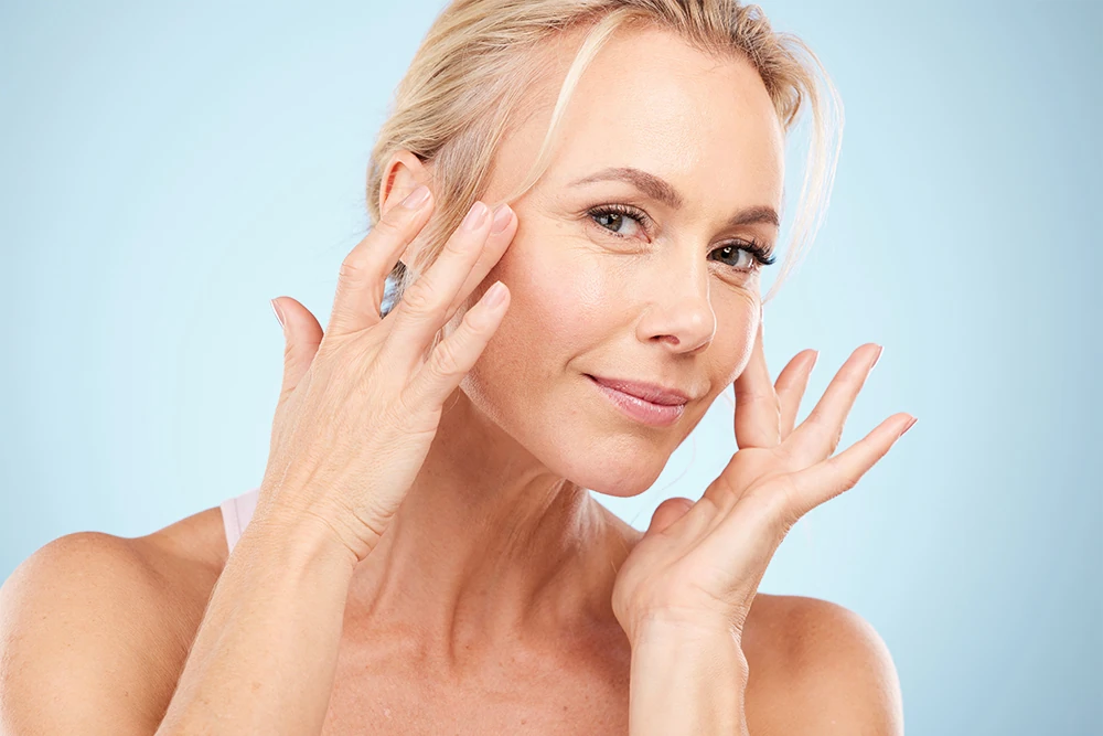 woman touching her skin