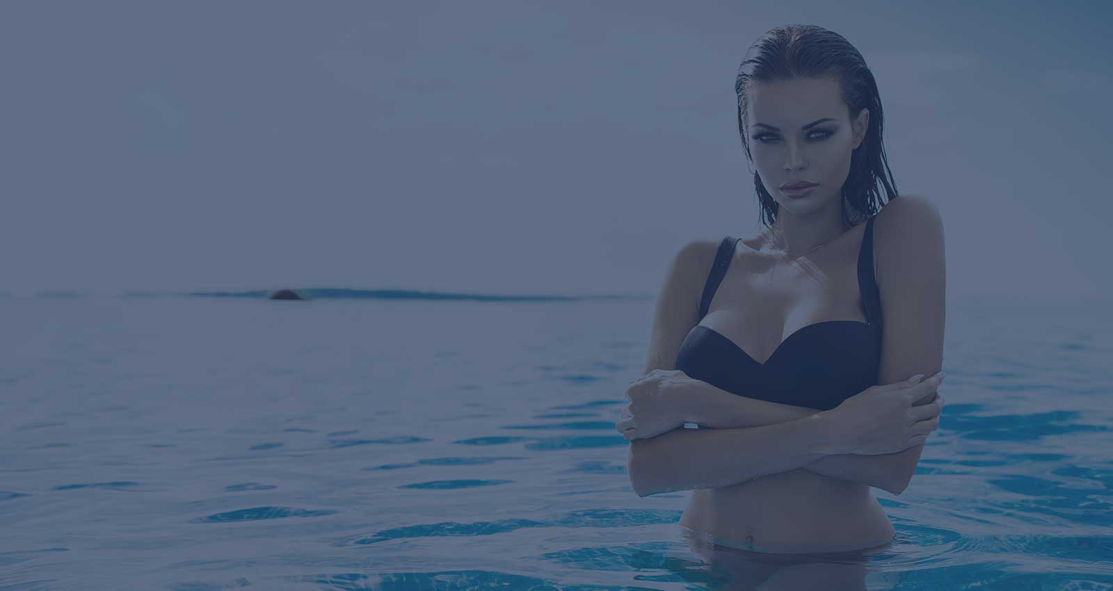 beautiful female standing in water